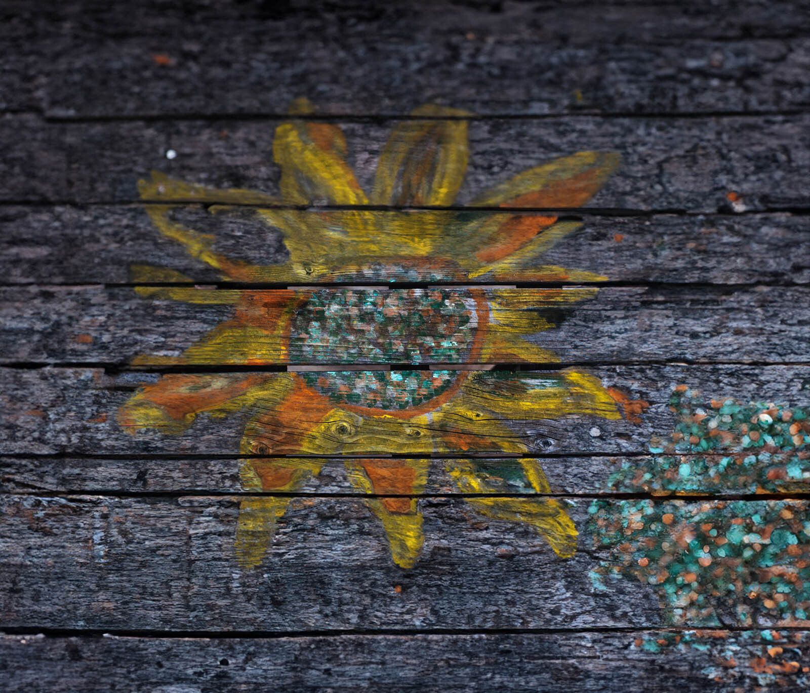 Painting of sunflower on wooden boards, faded