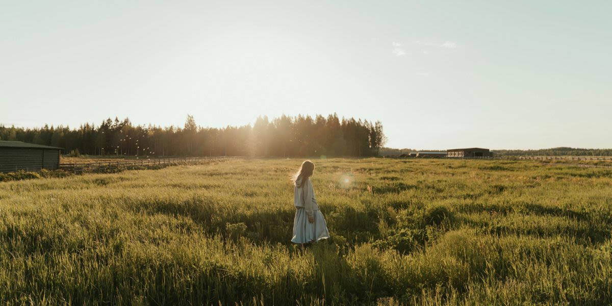 Woman in a an open field