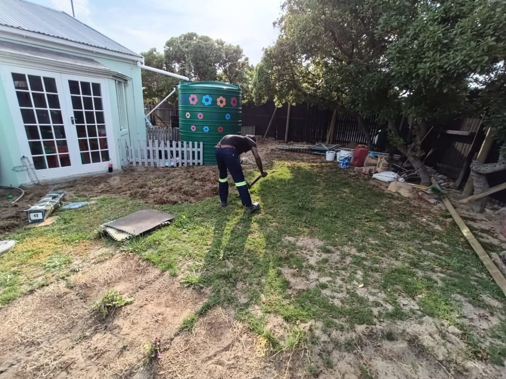 Before - Artificial grass and paving project in Table View