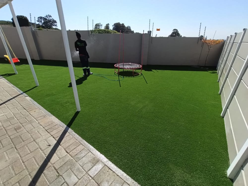 After - Artificial grass and paving project in Table View