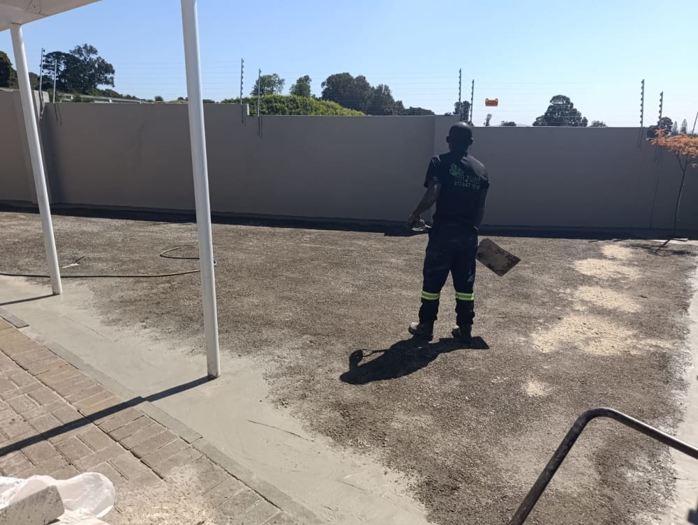 Before - Artificial grass and paving project in Table View