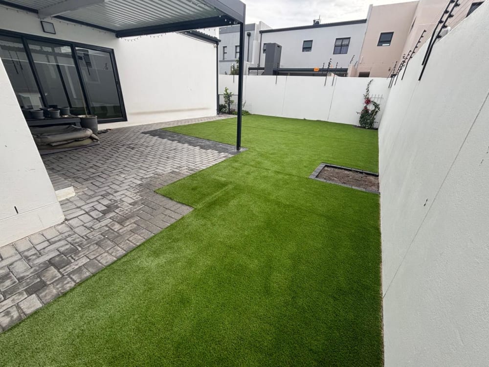 After - Artificial grass and paving project in Table View