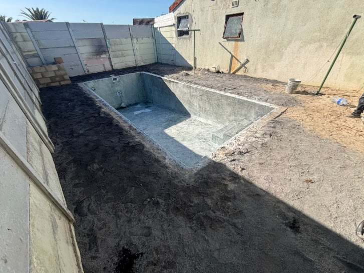 Before - Artificial grass and paving project in Table View