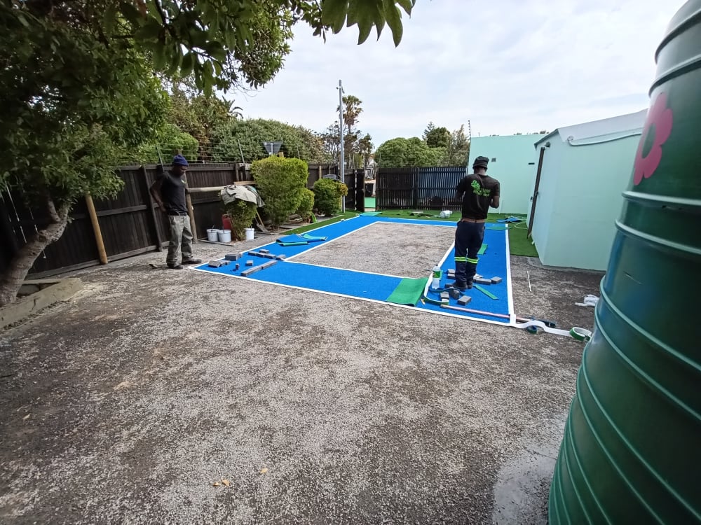 Before - Artificial grass and paving project in Table View