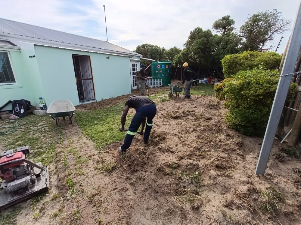 Before - Artificial grass and paving project in Table View