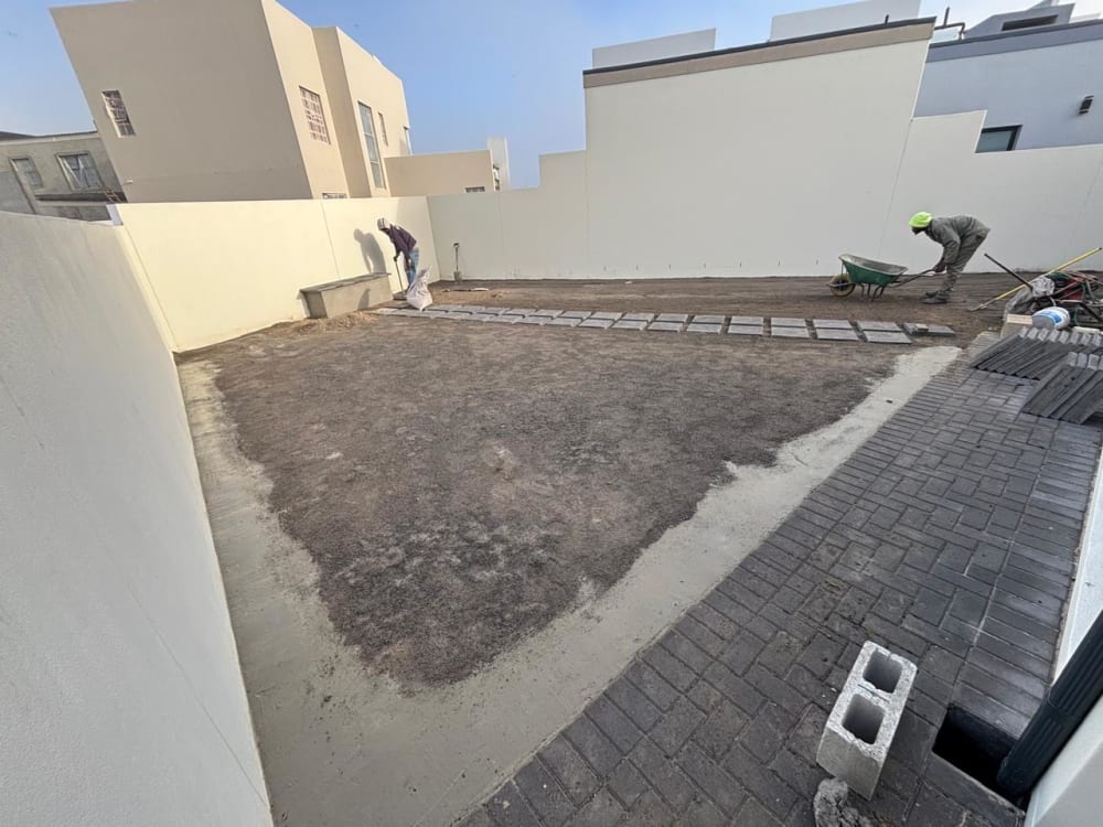 Before - Artificial grass and paving project in Table View