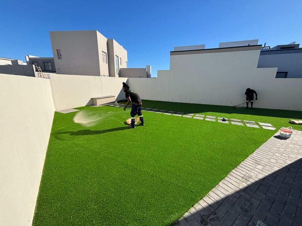 After - Artificial grass and paving project in Table View