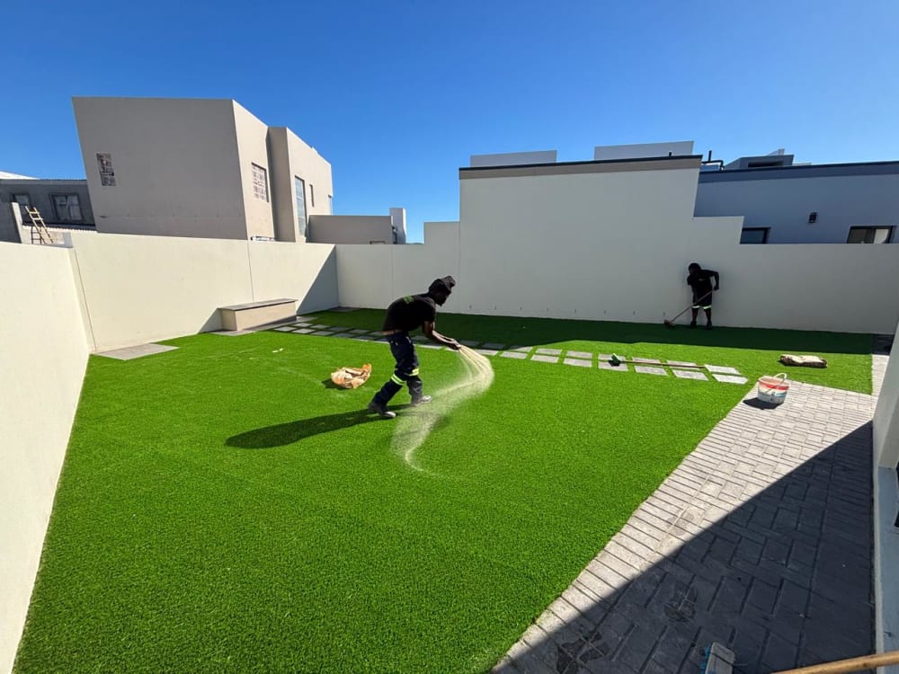 After - Artificial grass and paving project in Table View