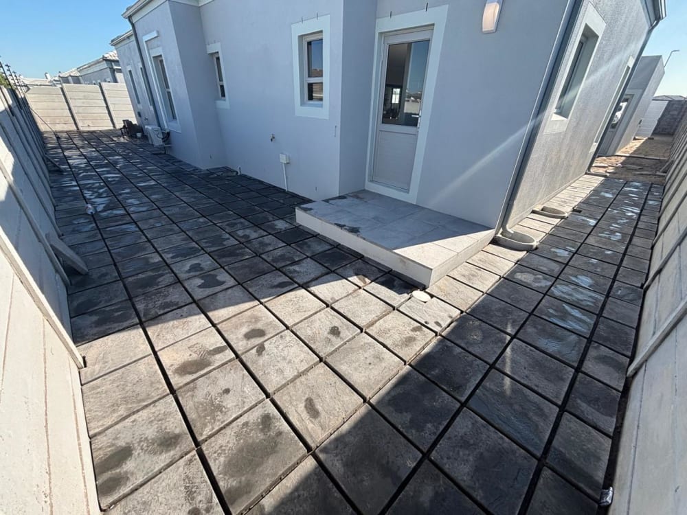 After - Artificial grass and paving project in Table View