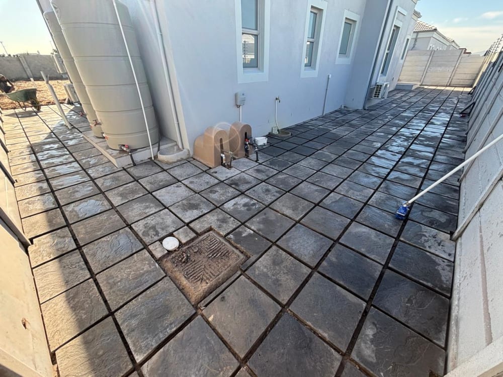 After - Artificial grass and paving project in Table View