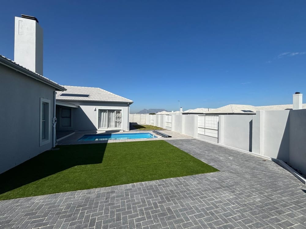After - Artificial grass and paving project in Table View