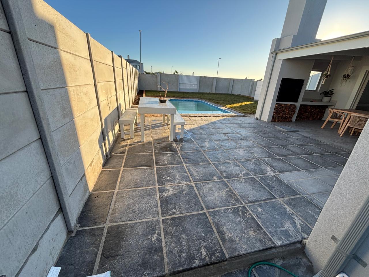 After - Artificial grass and paving project in Table View