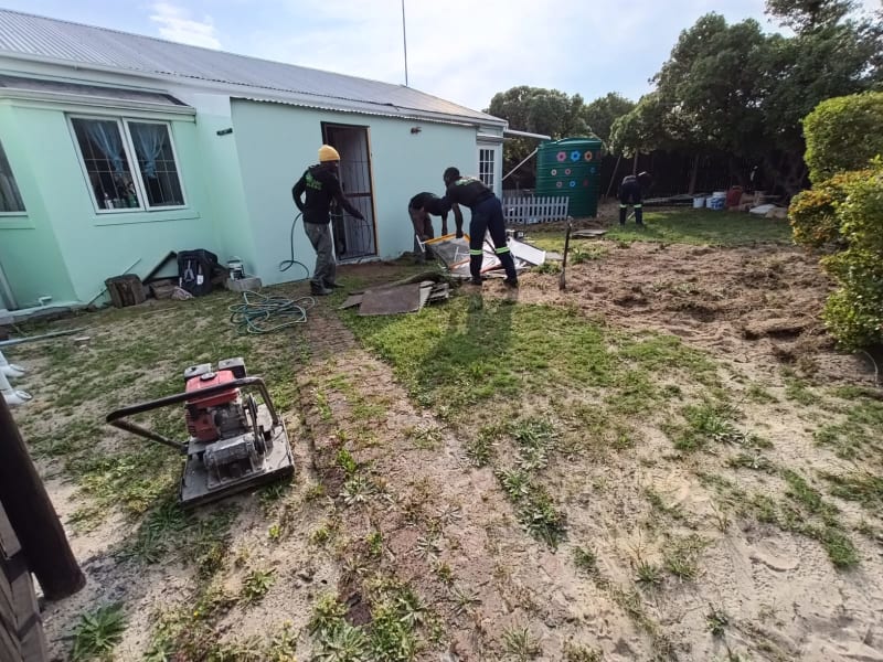 Artificial grass around swimming pool