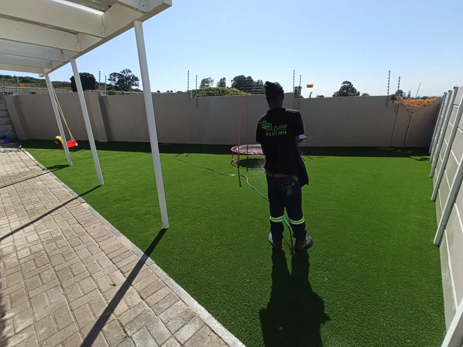 After - Artificial grass and paving project in Table View