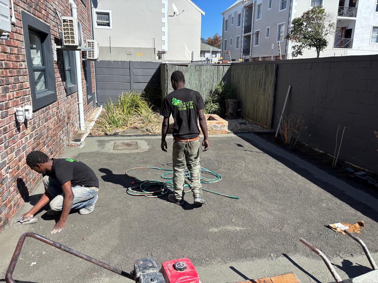 Before - Artificial grass and paving project in Table View