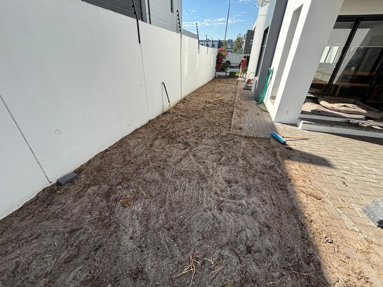 Before - Artificial grass and paving project in Table View
