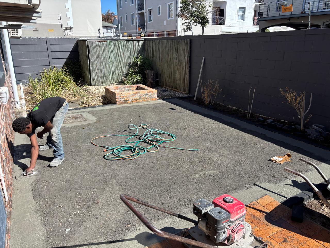 Before - Artificial grass and paving project in Table View