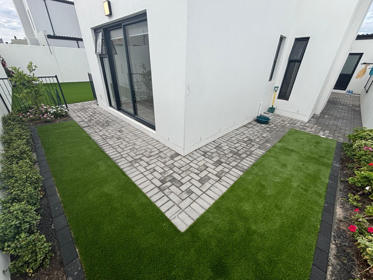 After - Artificial grass and paving project in Table View