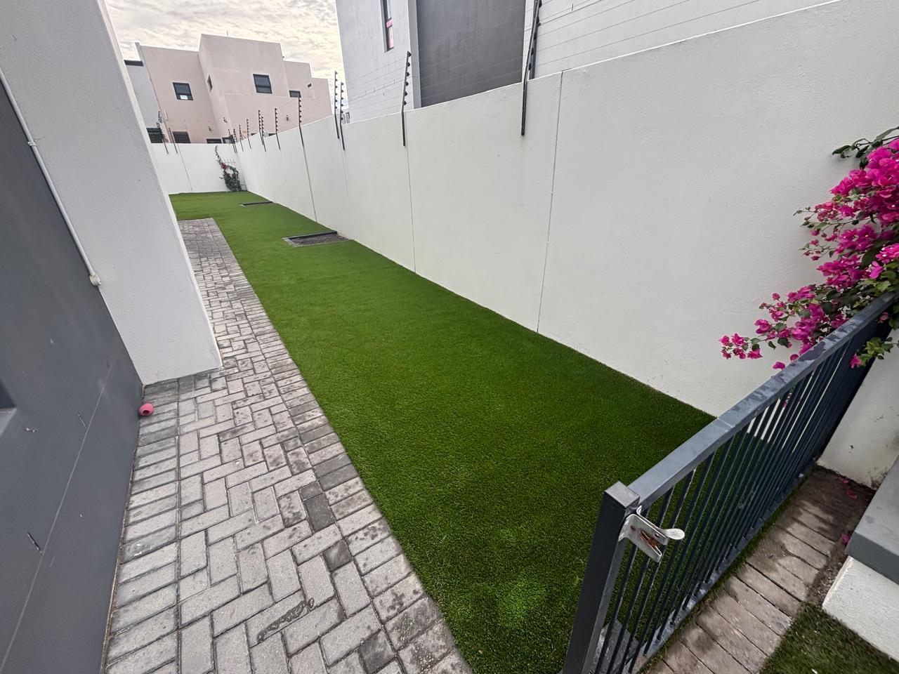 After - Artificial grass and paving project in Table View