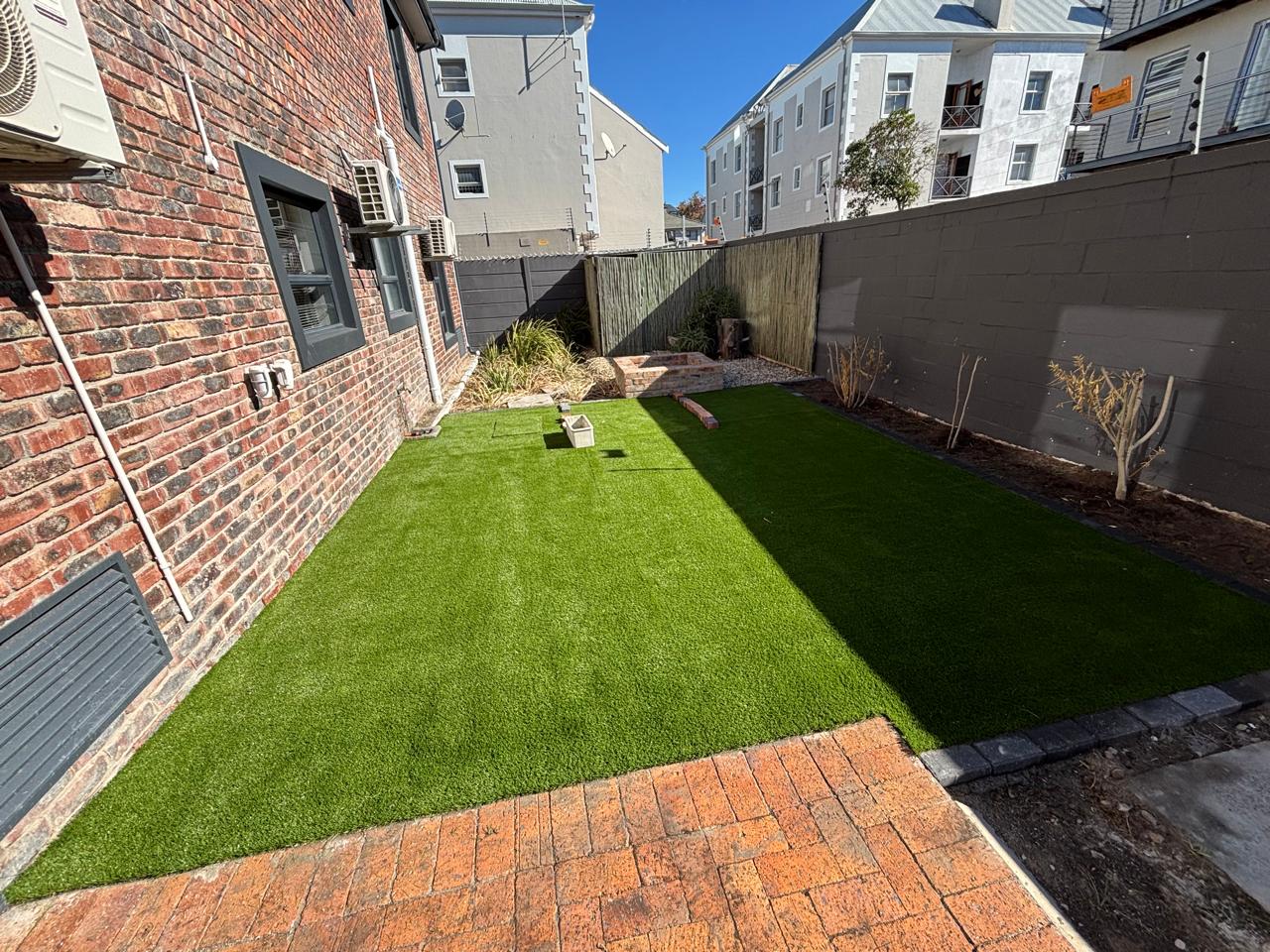 After - Artificial grass and paving project in Table View