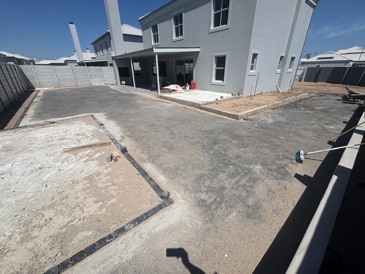 Before - Artificial grass and paving project in Table View