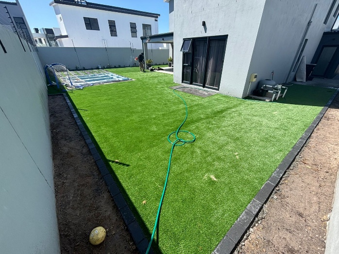 After - Artificial grass and paving project in Table View