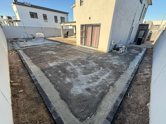 Before - Artificial grass and paving project in Table View