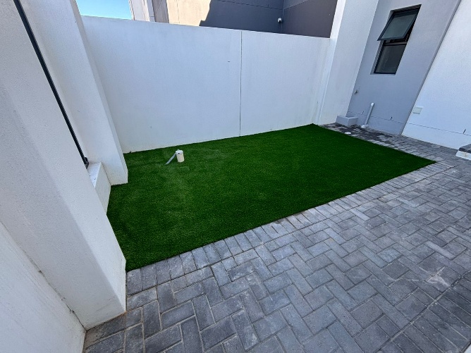 After - Artificial grass and paving project in Table View