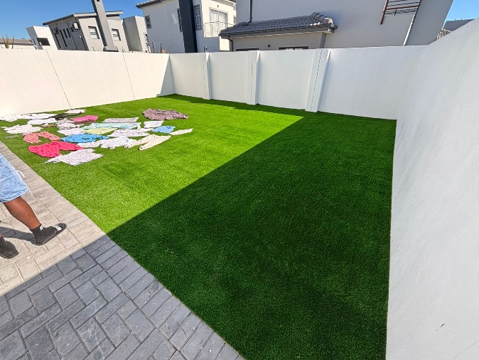 After - Artificial grass and paving project in Table View