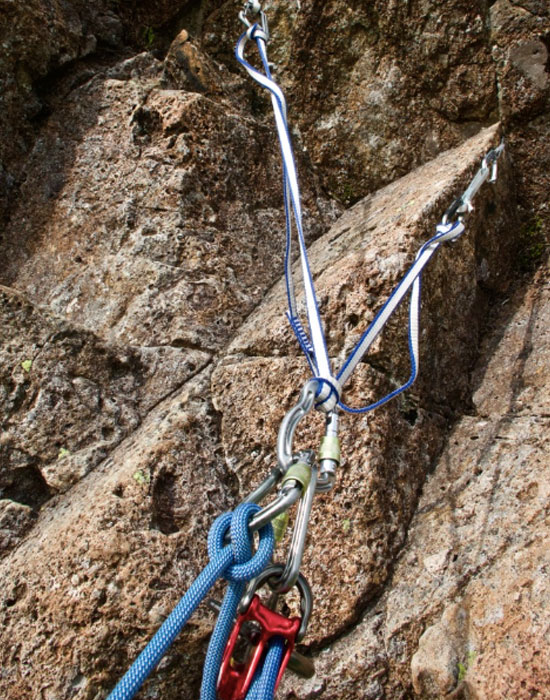 Anchoring devices and webbing