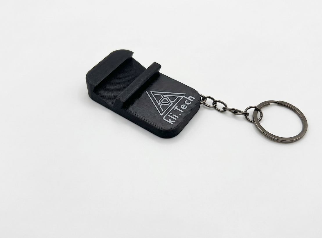 מחזיק מפתחות חכם משולב מעמד לטלפון