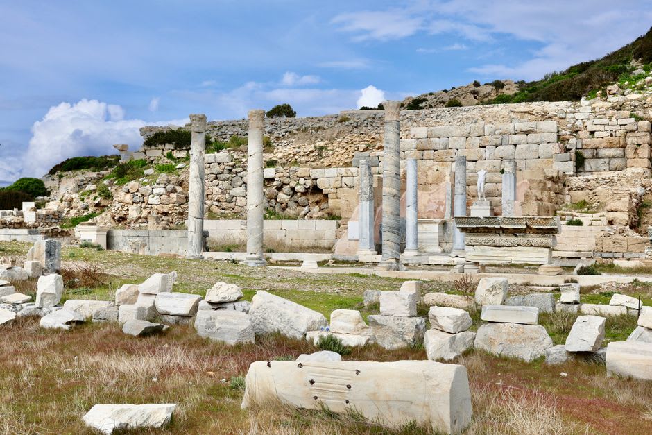 The circular foundation stones of the Temple of Aphrodite at Knidos on a hillside overlooking the twin harbors