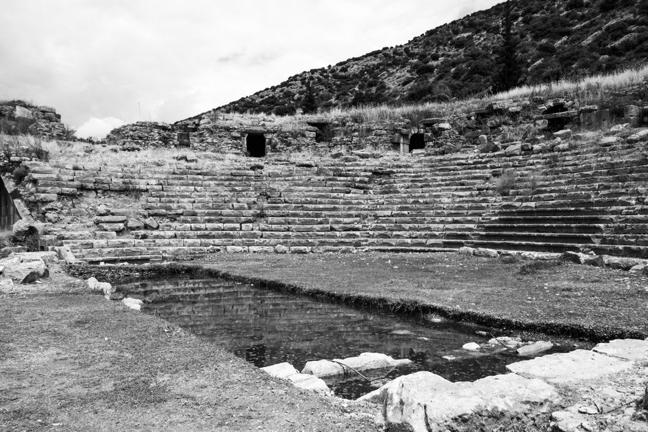 The ancient theater at Knidos overlooking one of the city's two harbors, with the open Aegean sea beyond