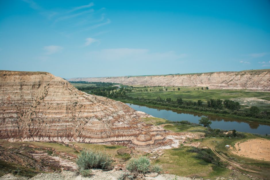 The view from the clifftop at Head-Smashed-In looking out over the open prairie where bison drive lanes once stretched for kilometres