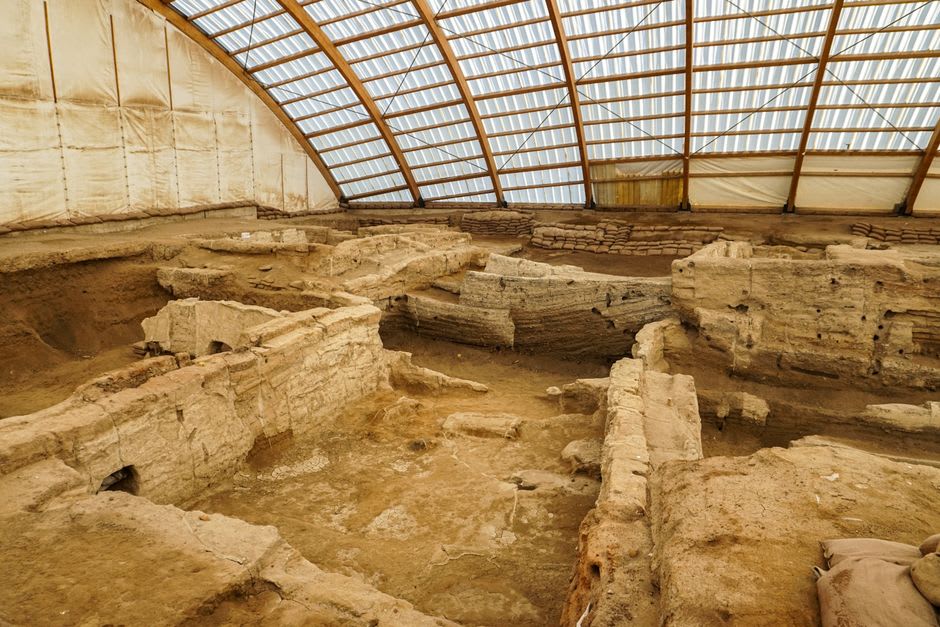 Excavation site inside the cave showing marked sediment layers