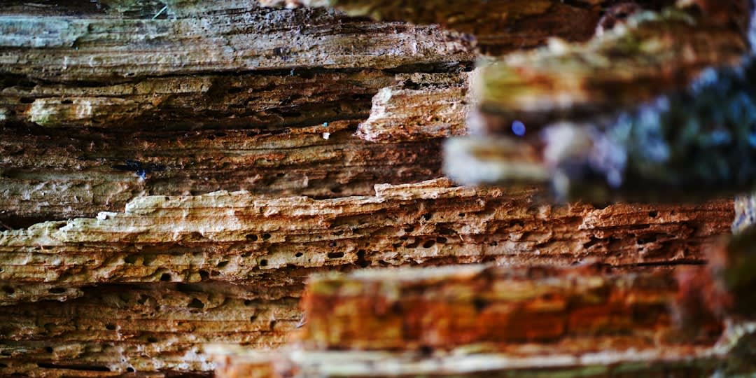 Layered red and yellow mineral bands on the slopes of Kyzyl-Chin Valley