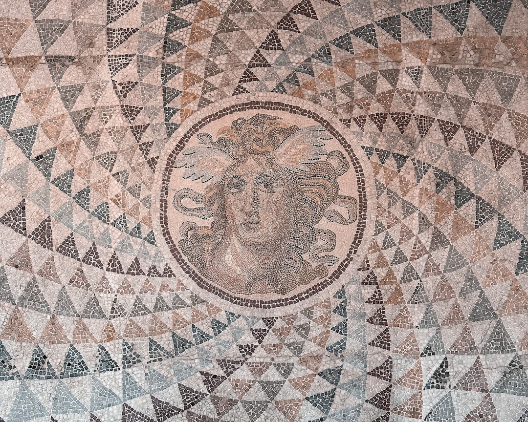 Geometric mosaic floor inside the excavated Roman villa in Minori