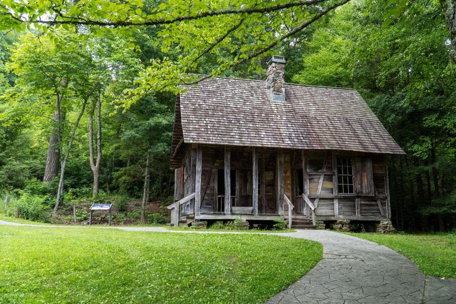 Weathered cabin and split-rail fence at the Hensley Settlement