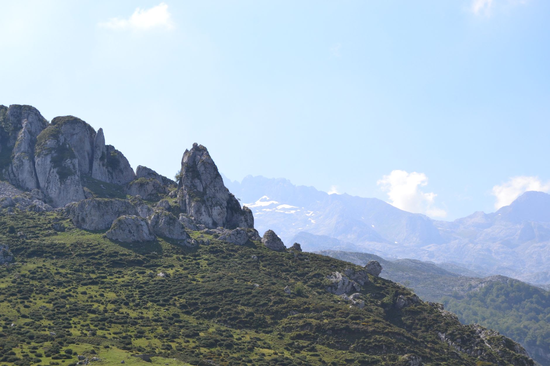 The lunar limestone plateau above Fuente Dé cable car station under a vast blue sky