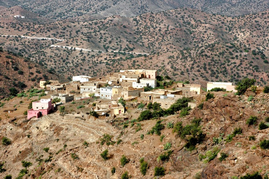 Communal agadir granary with rows of locked wooden storage chambers in Ait Bouguemez