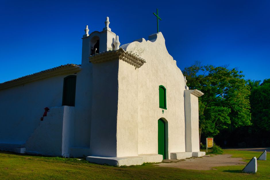 Colonial-era church facade in the town of Itaparica with weathered white walls