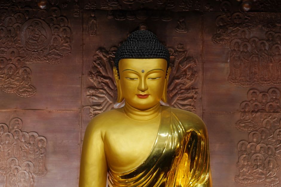The bronze Buddha statue inside the Kuakata Rakhine Buddhist temple