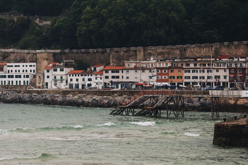 Weathered stone steps and colorful shuttered houses along the Pasai Donibane waterfront