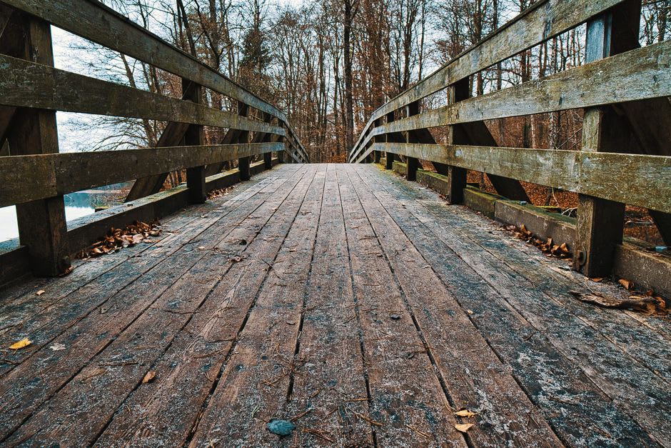 A wooden footbridge crossing the Wutach River between steep gorge walls