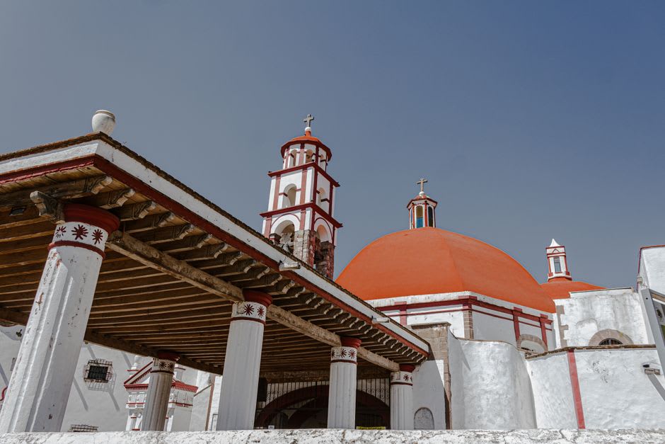 The Socavón Sanctuary in Oruro perched above the old mine shaft, with the altiplano stretching behind it