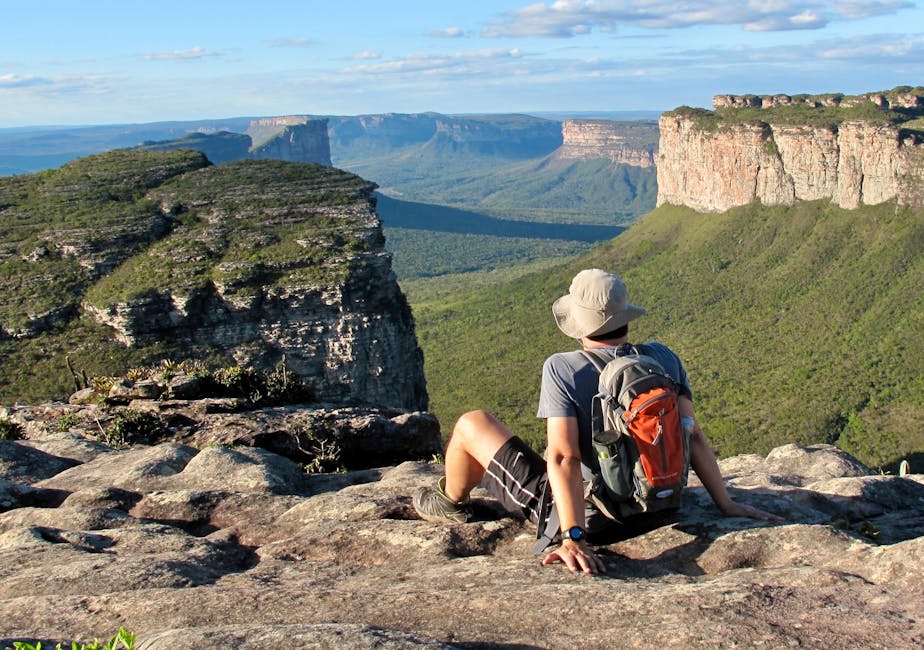 Sweeping view across the Chapada Diamantina valley with mist rising from the plateaus