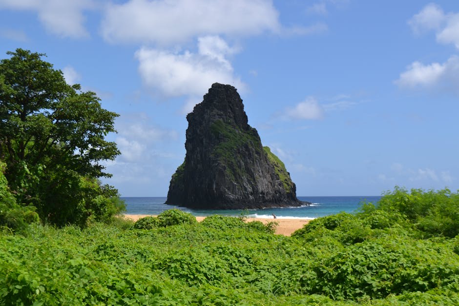 Aerial view of Fernando de Noronha's volcanic islands surrounded by deep blue ocean