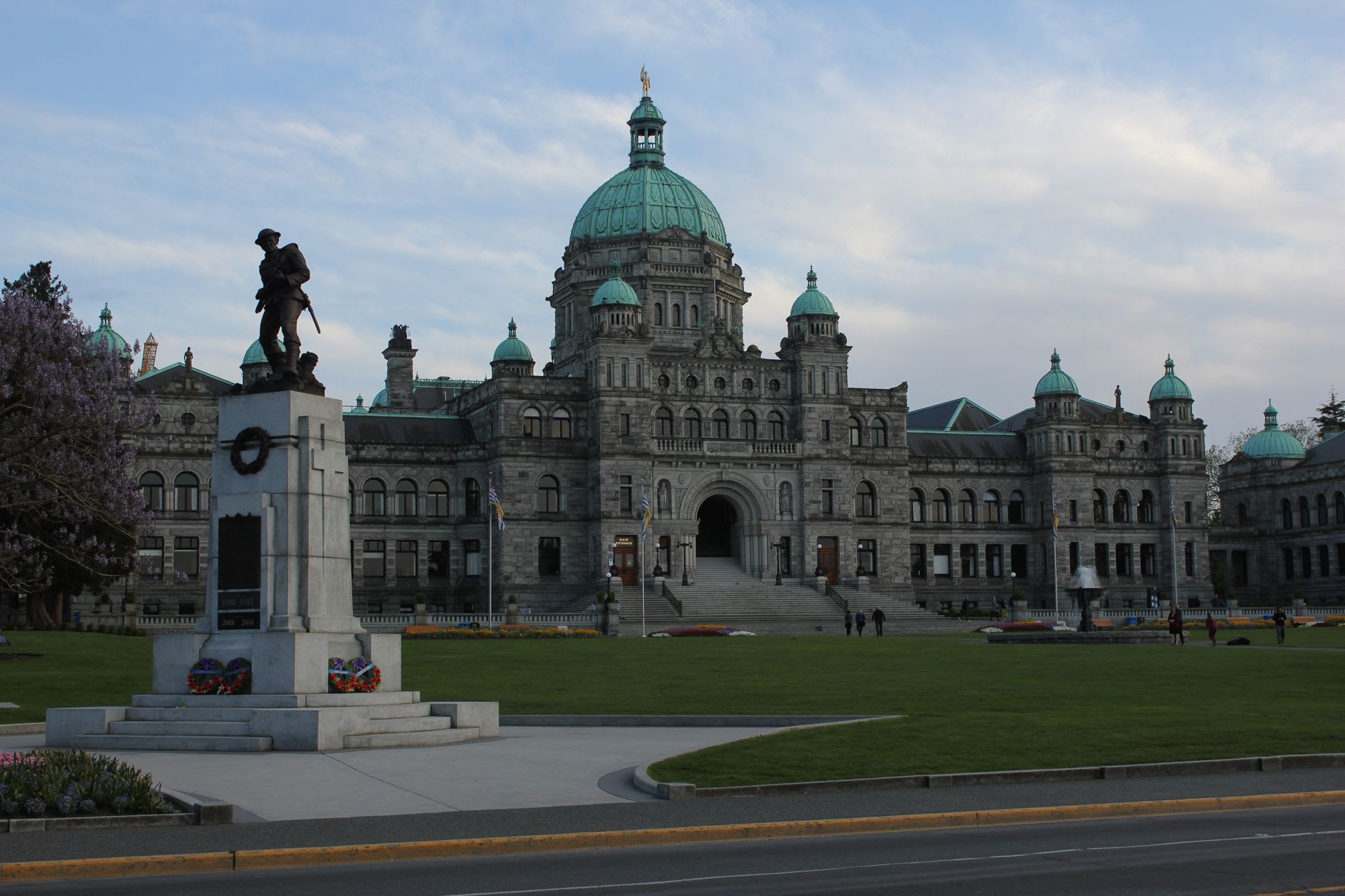 Victoria's inner harbour in morning light with the Parliament Buildings and classic floatplane