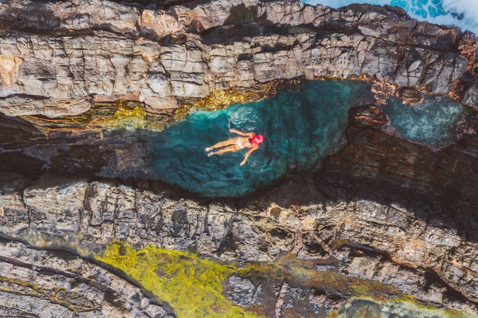 Turquoise swimming pool at the base of the canyon cliffs where the São Francisco River widens