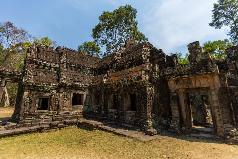 The majestic towers of Angkor Wat rising above the surrounding jungle